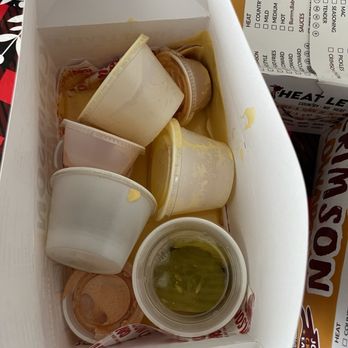 Crimson Coward - Cheese sauce all over the box of sauces. - Chicken Shop Near Me - Downey, California