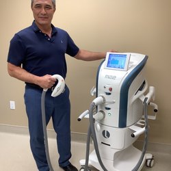Christopher Tiner, MD - Dr Tiner with our M22 multi-wave length laser.