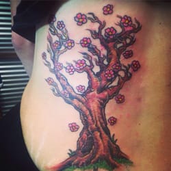 Skeleton Key Tattoo Company - Joe did a cover up on an old tattoo. The color is amazing and the tree is amazing. Definitely is better than the original!
