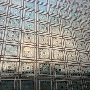 Soc Des Amis Institut Du Monde Arabe - the very cool windows which are mechanical on the inside. the design opens and closes. - Museums Near Me - Paris, 75 Soc Des Amis Institut Du Monde Arabe - the very cool windows which are mechanical on the inside. the design opens and closes. - Museums Near Me - Paris, 75