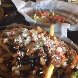 STREET - Taco & Beer Co. - Al pastor fries during happy hour ($5.50) + 1 free taco with Yelp check in