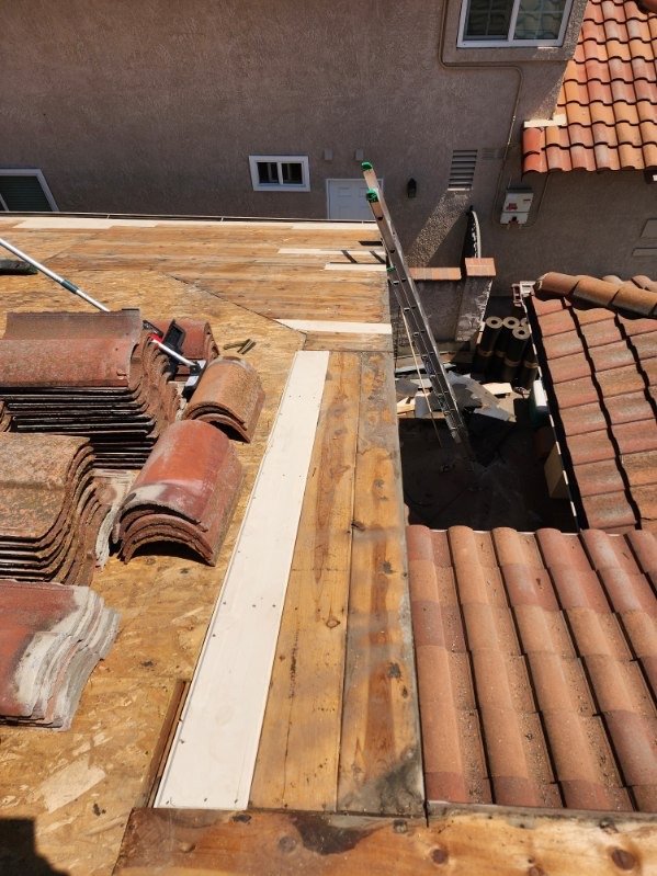 Slide of MMM Roofing