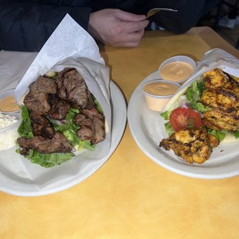 Gyro House Mediterranean Grill - Lamb Kebab Gyro with Side Spicy Garlic Sauce and feta cheese - Mediterranean Near Me - Beaverton, Oregon Gyro House Mediterranean Grill - Lamb Kebab Gyro with Side Spicy Garlic Sauce and feta cheese - Mediterranean Near Me - Beaverton, Oregon