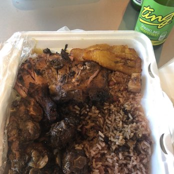 Bikkle Jamaican Restaurant - combination plate with oxtail and chickeN with rice and beans - Caribbean Near Me - Austin, Texas