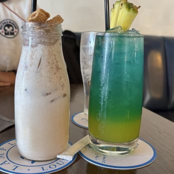 Lamplight Lounge - Neverland Tea on the right always a great pick from their "secret menu" Cinnamon Toast Cocktail on the left also very creamy and delicious - New American Near Me - Anaheim, California Lamplight Lounge - Neverland Tea on the right always a great pick from their "secret menu" Cinnamon Toast Cocktail on the left also very creamy and delicious - New American Near Me - Anaheim, California