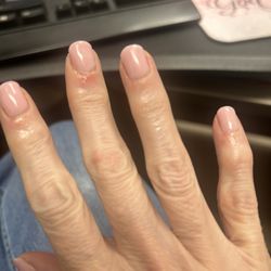 The Nail Room - My hands 24 hours after the manicure. You can see where she cut me all those times.