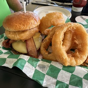 Boosters Bar And Grill - Original boosters burger with onion rings - Sports Bars Near Me - The Villages, Florida Boosters Bar And Grill - Original boosters burger with onion rings - Sports Bars Near Me - The Villages, Florida