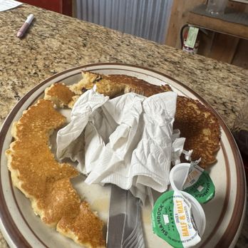 Cowboy Cafe - Felt bad- did try to eat the middle after sopping up the butter with a napkin... maybe had 1/3 of the pancake - Breakfast & Brunch Near Me - Roswell, New Mexico