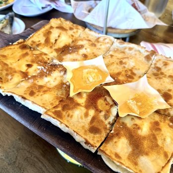 Davanti Enoteca - FOCACCIA DI RECCO w/ side of Honey comb , looks very simple but this was sooo good , i recommend getting this - Italian Near Me - San Diego, California Davanti Enoteca - FOCACCIA DI RECCO w/ side of Honey comb , looks very simple but this was sooo good , i recommend getting this - Italian Near Me - San Diego, California