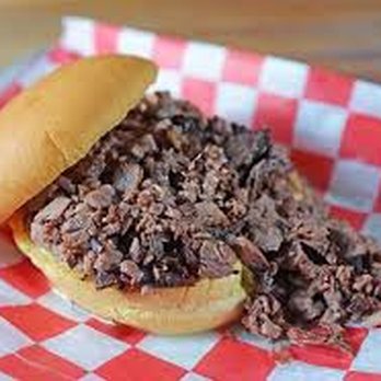 Kik's BBQ - Our signature chopped beef sandwich on a buttered bun. - Coffee & Tea Near Me - Humble, Texas