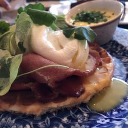 Violets Cafe - Eggs Benedict on buttermilk waffles.