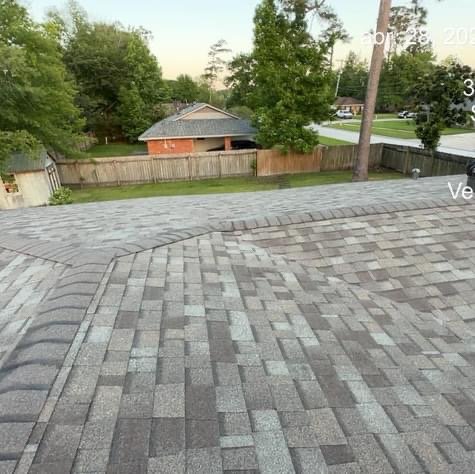 Slide of Urbina Roofing