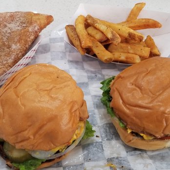 Black Cattle Burger - This is as it appeared after unwrapping. Looks nothing like they advertise. - Burgers Near Me - St Petersburg, Florida Black Cattle Burger - This is as it appeared after unwrapping. Looks nothing like they advertise. - Burgers Near Me - St Petersburg, Florida