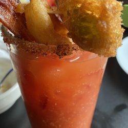 The Exchange by Twist - The Good Boy (Bloody Mary, Tajin rim, garnish with celery, fried pickle, bacon, mozzarella stick and onion ring)