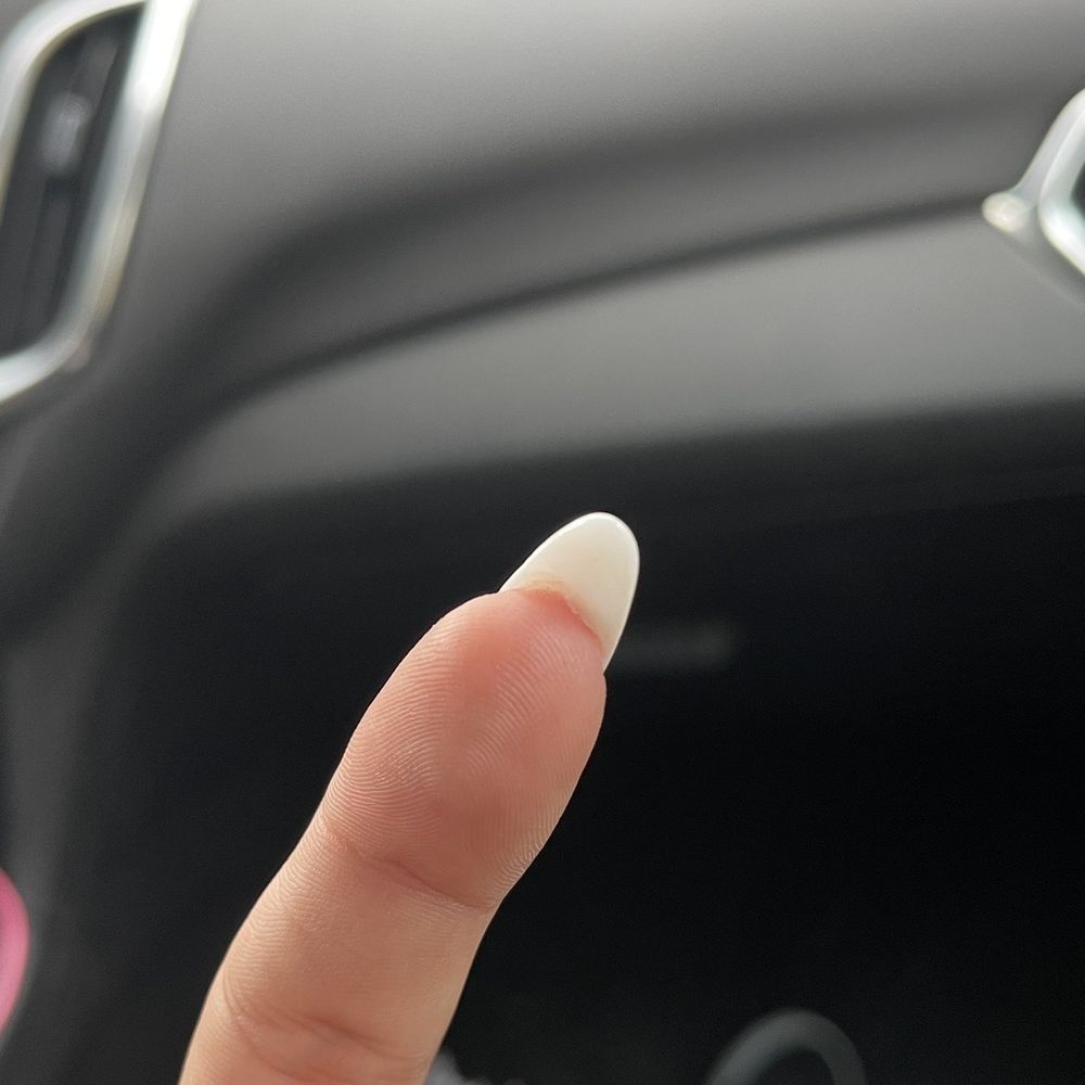 Allure Nails Spa - Build up of material under nail when I asked him to file it away twice - Nail Salons Near Me - Capitol Heights, Maryland