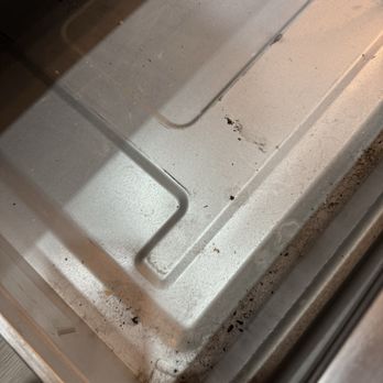 Cozy Casa Cleaning Solutions - Inside of oven drawer.... - Office Cleaning Near Me