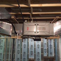 Complete Climate Control - New construction Installation of a Gas Furnace with Air Conditioning and duct work