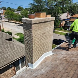 Tuckpointing and redoing the flashing around my chimney