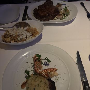 Eddie V's Prime Seafood - 22 oz USDA Prime Bone-In Ribeye w/ Georges Bank Scallops - Seafood Near Me - Mclean, Virginia