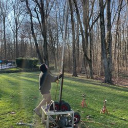 Tactical Well Pump Services - Using a well pump puller to pull rigid piping on a well that was 320 ft deep.