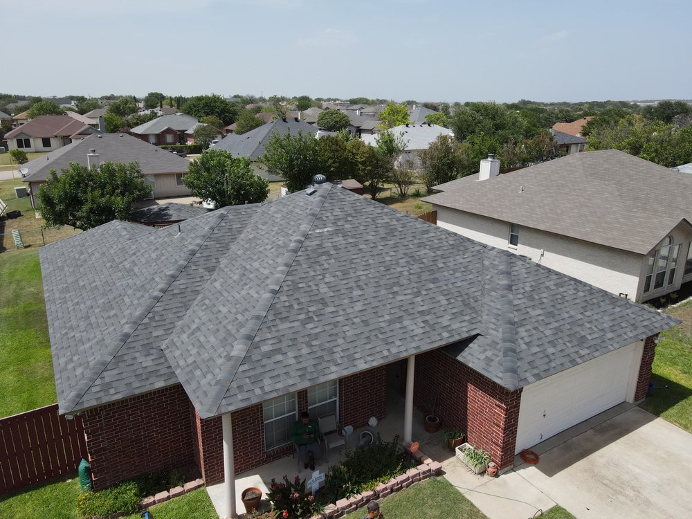 Slide of Denali Roofing
