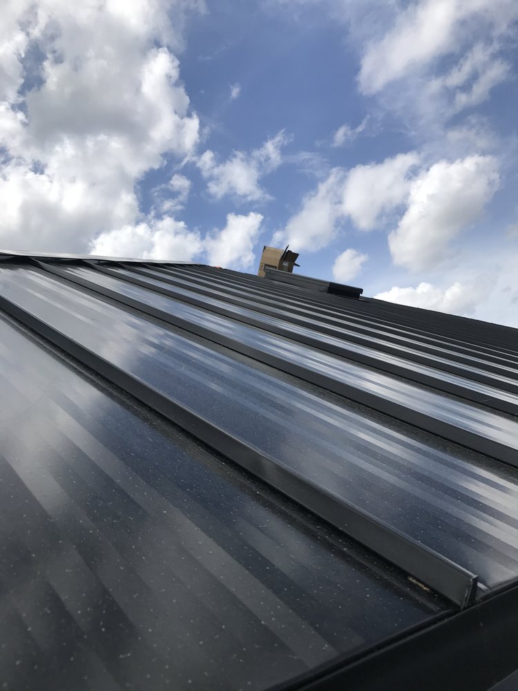 Slide of Hickman Metal Roofing