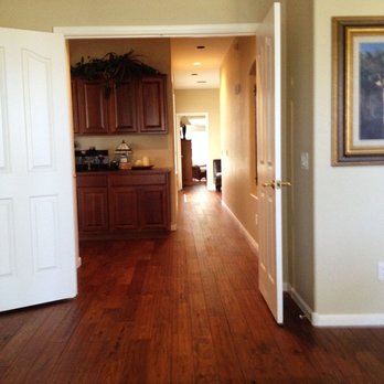AZ Supreme Flooring - a hallway leading to a kitchen - Flooring Near Me - Chandler, Arizona AZ Supreme Flooring - a hallway leading to a kitchen - Flooring Near Me - Chandler, Arizona