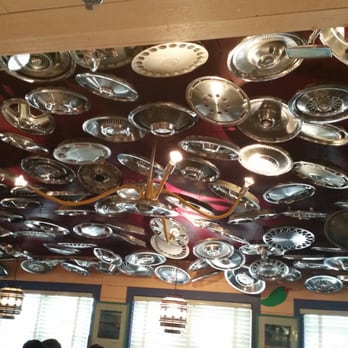 Chuy's - Hub caps and review mirrors on ceilings. Fun idea - Mexican Near Me - Rogers, Arkansas Chuy's - Hub caps and review mirrors on ceilings. Fun idea - Mexican Near Me - Rogers, Arkansas