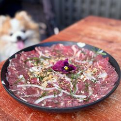 Me Va Con Vietnamese Kitchen - Bò Tái Chanh: Beef Carpaccio w/ Thai basil, fried shallot, house tangerine sauce ($18)