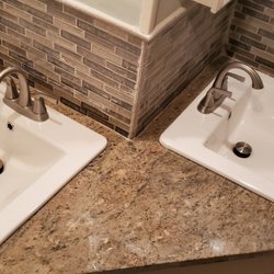 G G Greer Plumbing - Install of ceramic drop in sinks into marble vanity top