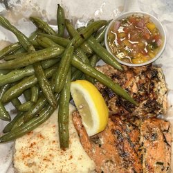 Island Vibez Cafe & Coffeehouse - Wild caught sockeye salmon, Roasted garlic mash potatoes and French green beans,