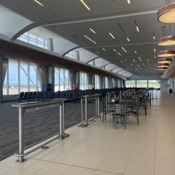 Plattsburgh International Airport - Restaurant area with chargers