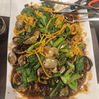 Korean Noodle House - Steamed clams with spicy sauce and noodles. - Korean Near Me - Flushing, New York Korean Noodle House - Steamed clams with spicy sauce and noodles. - Korean Near Me - Flushing, New York