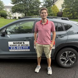 Norm's School of Driving - Image of Norms car + school of driving info