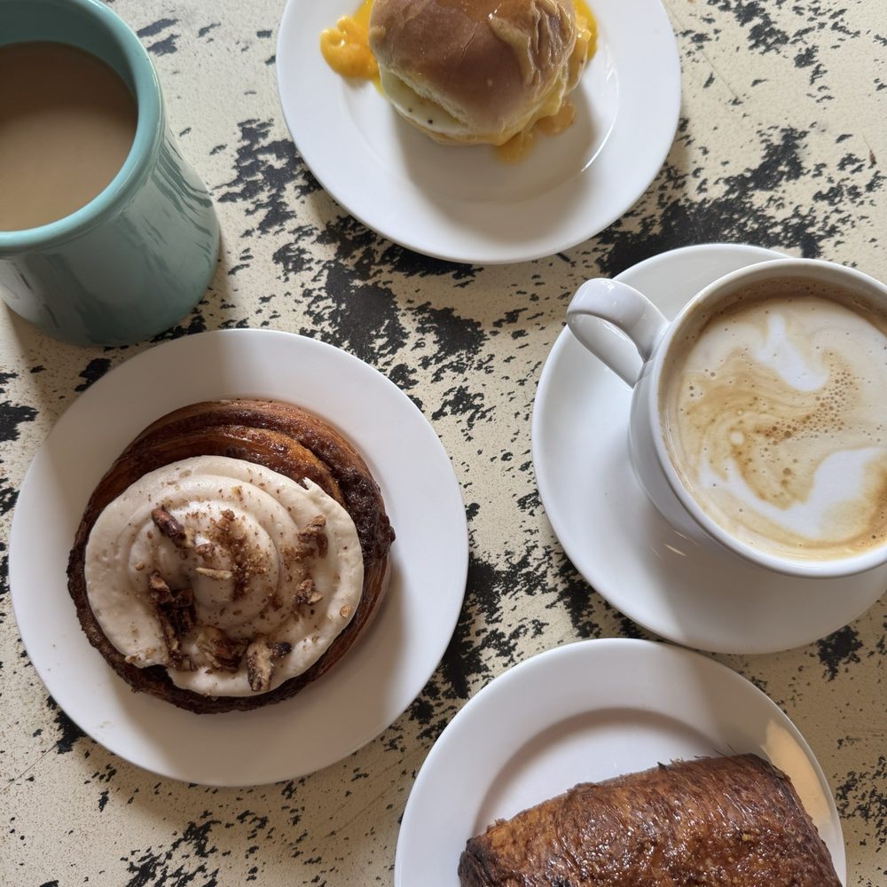 Egg and cheese slider, cinnamon roll, ham & cheese croissant, house drip coffee, caramel latte Egg and cheese slider, cinnamon roll, ham & cheese croissant, house drip coffee, caramel latte