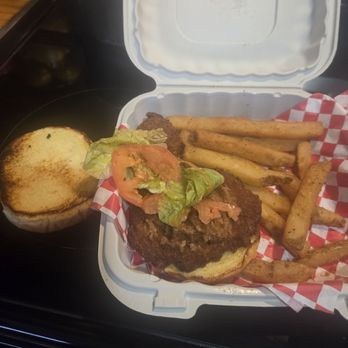 Captain Mc's Seafood - Small smushy lettuce and tomato with no sauce. - Seafood Near Me - Houston, Texas