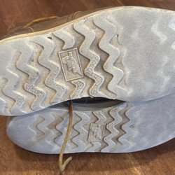 George's Shoe Store & Repair - Old worn out soles