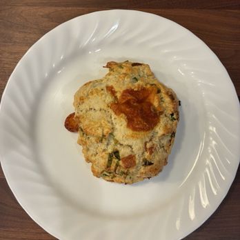 Bake - Cheddar onion scone (on dinner plate [!] for scale) - Bakeries Near Me - Chicago, Illinois