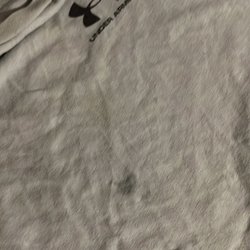 Kimball Laundry & Dry Cleaning - Our clothes that had some kind of grease spots when they came out of the dryer. Nothing like ruining 100.00 worth of clothes.