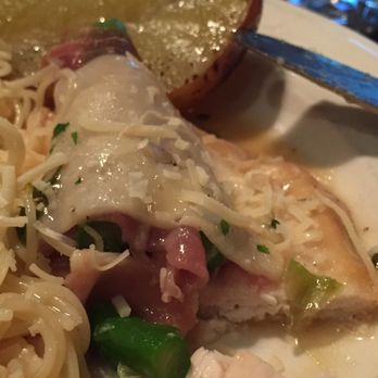 La Gondola - Val d'aosta up close. Prosciutto wrapped asparagus on chicken in white wine garlic sauce. - Italian Near Me - Mansfield, Texas