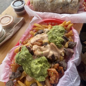 The Taco Stand - Mar y Tierra Fries and California Burrito was soo gooooood! . - Food Stands Near Me - La Jolla, California