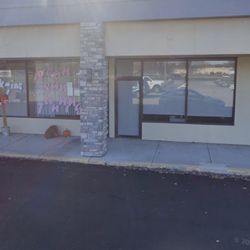 Neon Sun Tanning - Front of building