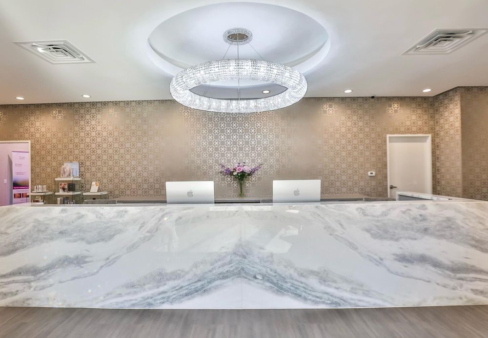 Bare with Me Electrology Logo