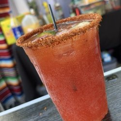 My Sister's Bartending Service - One of many peoples favorite choices Michelada with a tasty rim dipped