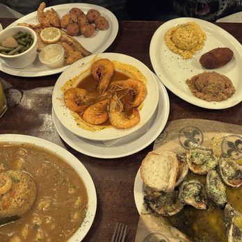 Neyow's Creole Cafe - That is a table just full of food!! Whoo! - Cajun/Creole Near Me - New Orleans, Louisiana