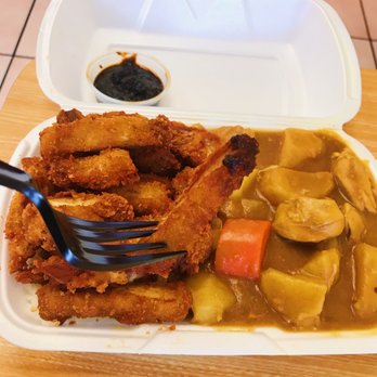 Tokyo Stop - a plate of food with a fork in it - Japanese Near Me - Tempe, Arizona