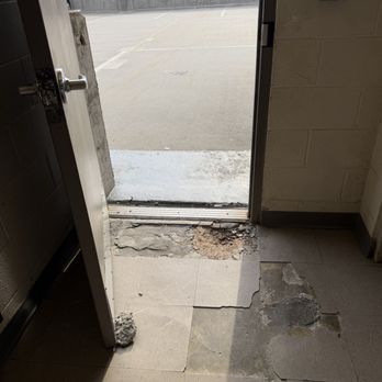 The Reserve at Tysons Corner - Door held open because the lock is broken. - Apartments Near Me - Vienna, Virginia The Reserve at Tysons Corner - Door held open because the lock is broken. - Apartments Near Me - Vienna, Virginia