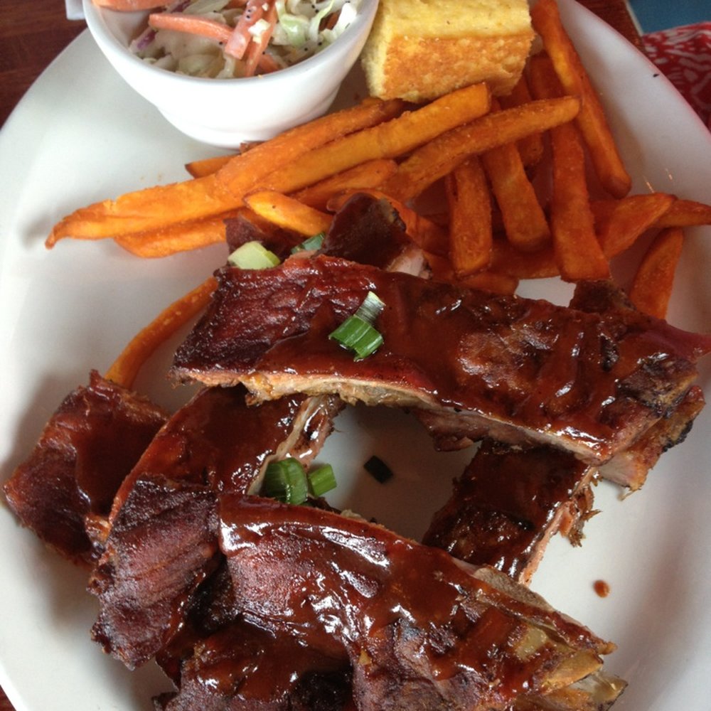 Ports Cafe - 1/2 Rack of Spare Ribs. My fiancée said she preferred them over Bone Appetite and Dinosaur BBQ, and she likes Dinosaur BBQ. - New American Near Me - Geneva, New York Ports Cafe - 1/2 Rack of Spare Ribs. My fiancée said she preferred them over Bone Appetite and Dinosaur BBQ, and she likes Dinosaur BBQ. - New American Near Me - Geneva, New York