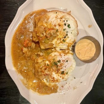 Voodoo Bayou - Crawfish Benedict with over easy eggs - Cocktail Bars Near Me - Orlando, Florida
