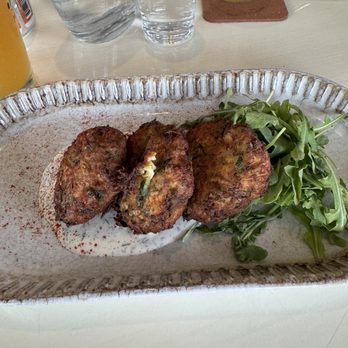 Point B - Zucchini Fritters over a Dill Yogurt Sauce - New American Near Me - Knoxville, Tennessee Point B - Zucchini Fritters over a Dill Yogurt Sauce - New American Near Me - Knoxville, Tennessee
